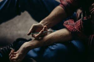 injecting heroin